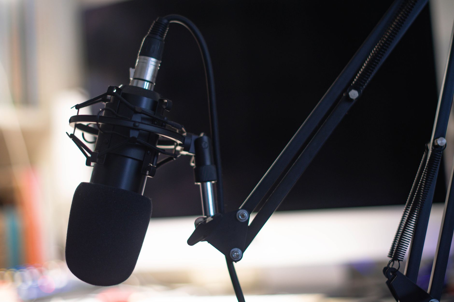 Close up of a studio condenser in a recording booth