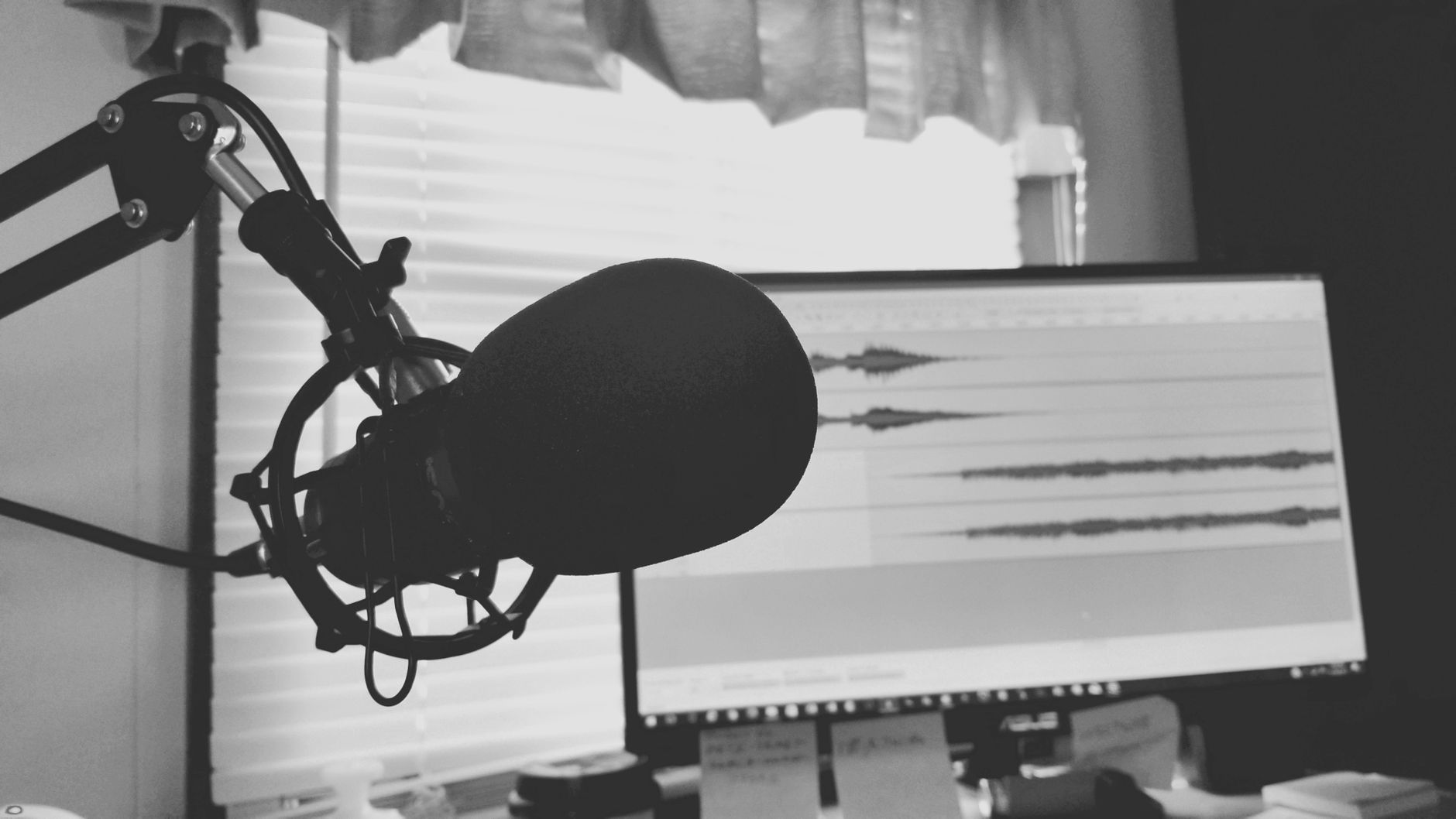 Home podcast and YouTube recording setup with a microphone