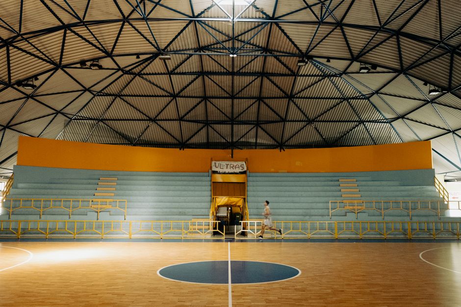 A basketball arena with stadium seating