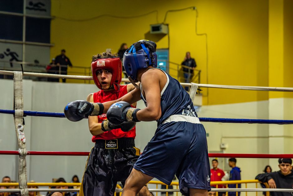 A boxing ring under bright arena lights